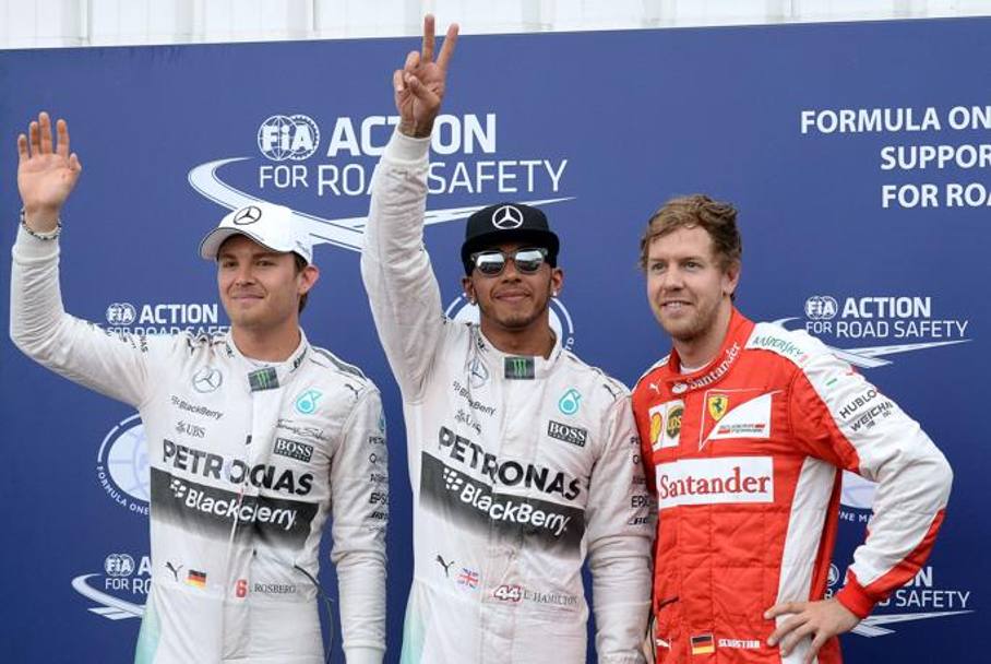 I primi tre delle qualifiche, con il poleman Hamilton fra Rosberg (2°) e Vettel (3°). Afp